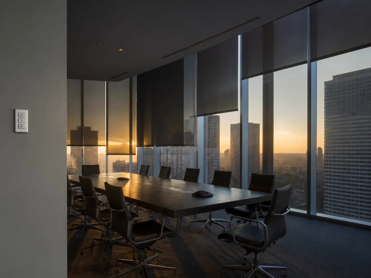 Motorized commercial roller shades in a conference room